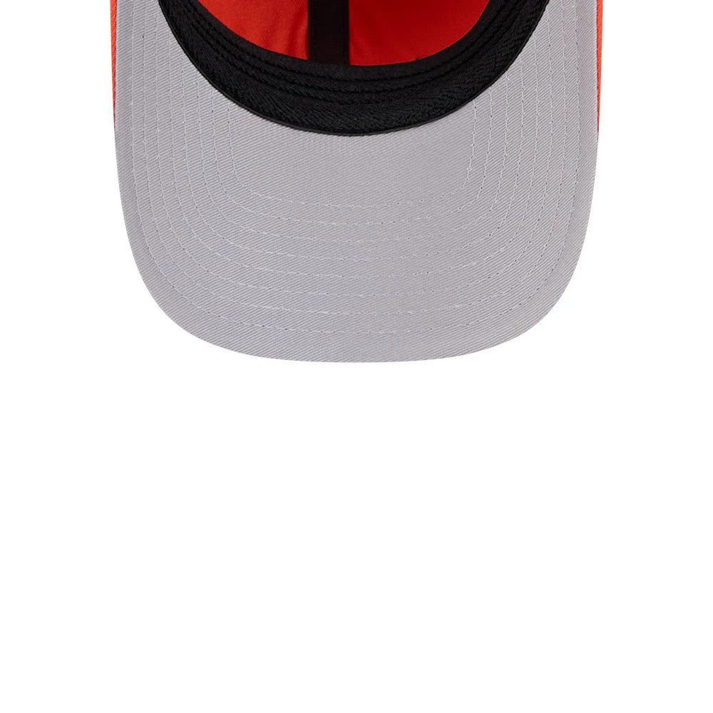 Anaheim Ducks NHL Team Orange New Era 39THIRTY M-Crown Stretch Fit Cap, inside view showing a bright orange interior with black taping and a black sweatband, plus a contrasting grey undervisor.