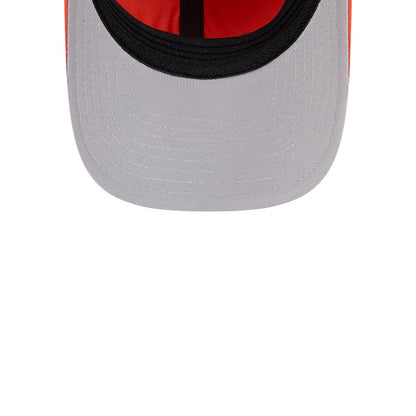 Anaheim Ducks NHL Team Orange New Era 39THIRTY M-Crown Stretch Fit Cap, inside view showing a bright orange interior with black taping and a black sweatband, plus a contrasting grey undervisor.