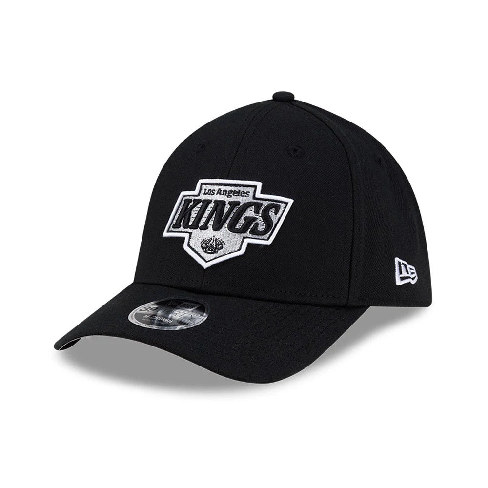LA Kings NHL Team Black New Era 39THIRTY M-Crown Stretch Fit Cap, three-quarter view showing the raised white and silver embroidered Los Angeles Kings logo on the front panel, with a curved black visor and a 39THIRTY size sticker on the visor.