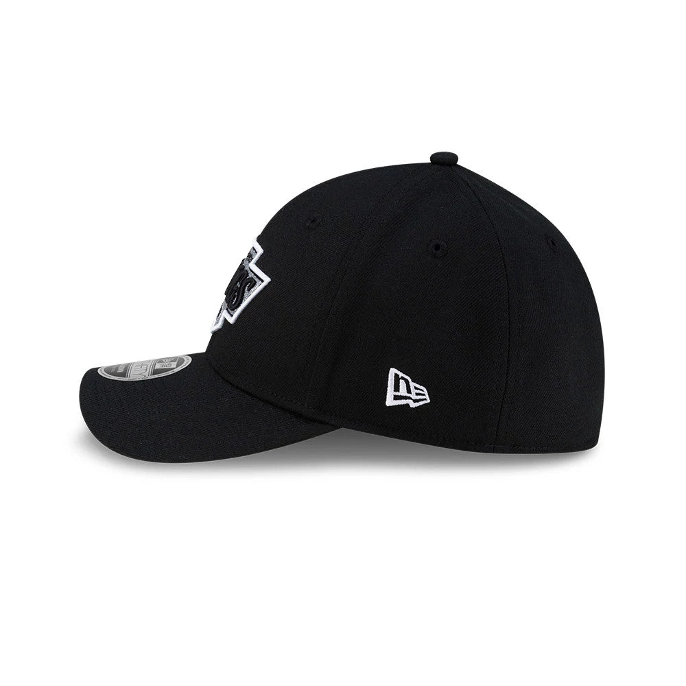 LA Kings NHL Team Black New Era 39THIRTY M-Crown Stretch Fit Cap, side view showing the white New Era flag logo embroidered on the left side, a structured black crown, and a black curved visor with the 39THIRTY size sticker on top.