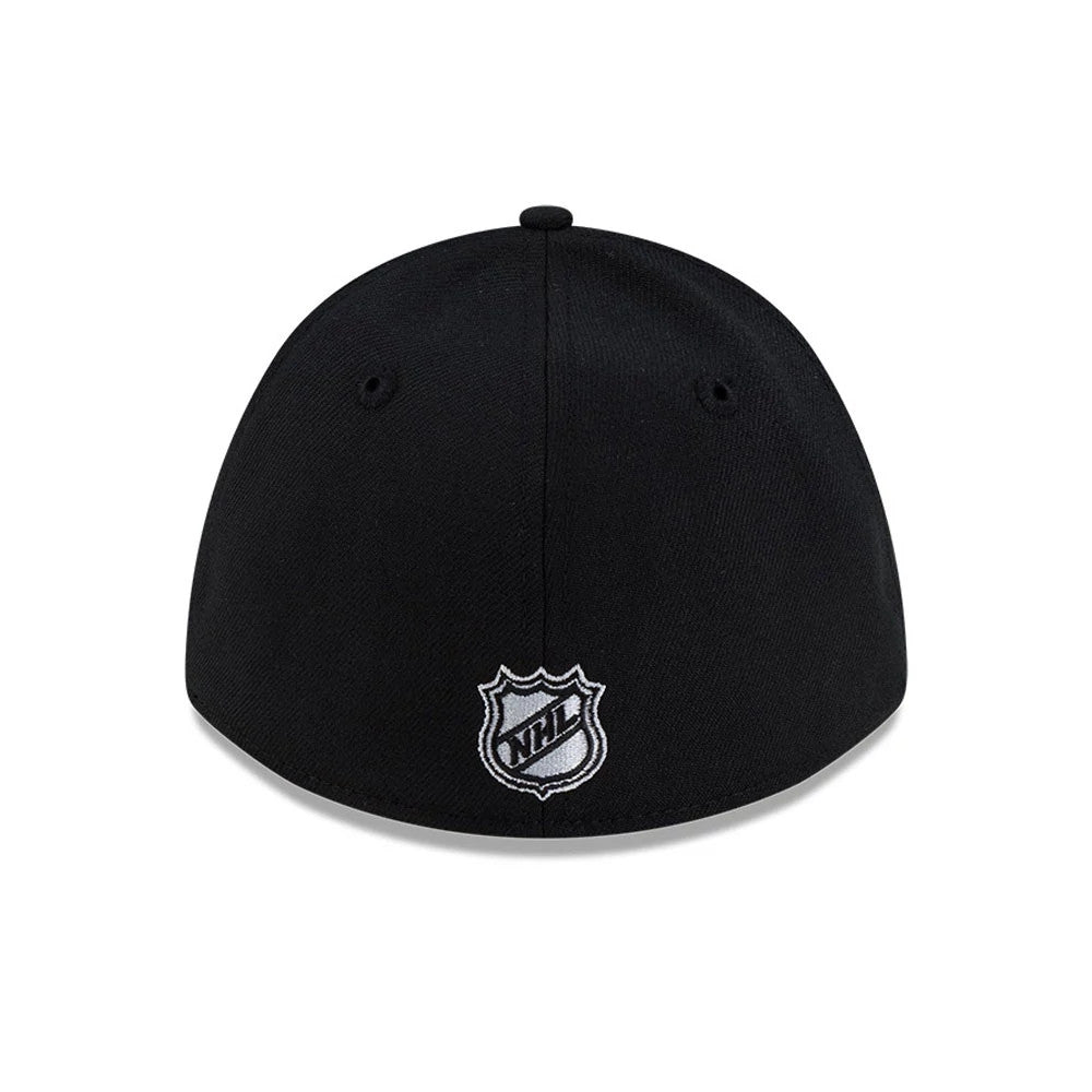 LA Kings NHL Team Black New Era 39THIRTY M-Crown Stretch Fit Cap, rear view showing the white embroidered NHL logo at the centre of the back, complemented by a structured black crown with matching top button and eyelets.