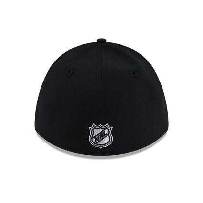 LA Kings NHL Team Black New Era 39THIRTY M-Crown Stretch Fit Cap, rear view showing the white embroidered NHL logo at the centre of the back, complemented by a structured black crown with matching top button and eyelets.
