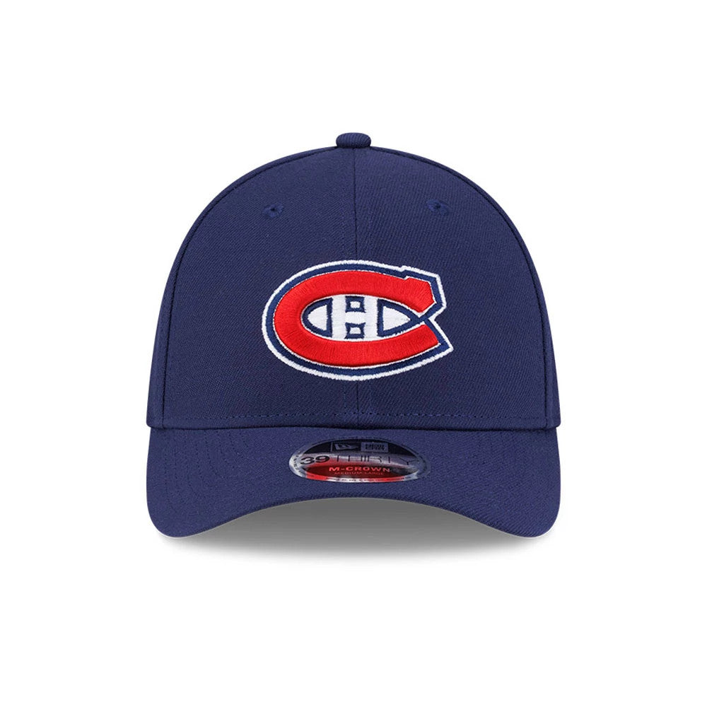 Pictured is this NHL Team Montreal Canadiens 39THIRTY M-Crown Stretch Fit cap in navy. 3