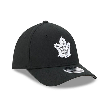 Toronto Maple Leafs NHL Black New Era 39THIRTY M-Crown Stretch Fit Cap, front view showing the raised white embroidered maple leaf logo on the front panel, curved black visor, and 39THIRTY size sticker on the visor.