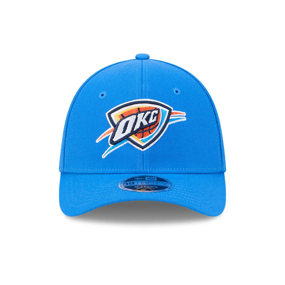 Oklahoma City Thunder NBA Team Blue New Era 39THIRTY M-Crown Stretch Fit Cap, front view showing raised embroidered OKC logo in white and orange on the centre of the structured blue crown, with a matching blue curved visor and 39THIRTY size sticker.