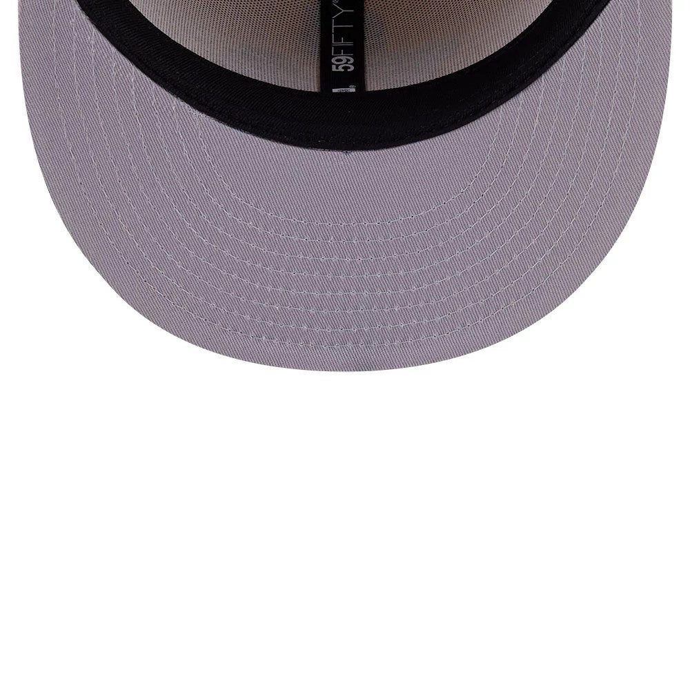 Avatar Elements Light Beige New Era 59FIFTY Fitted Cap, inside view showing the light beige undervisor with curved stitching, a contrasting black sweatband lining the inside of the cap, and a 59FIFTY branded taping across the centre.