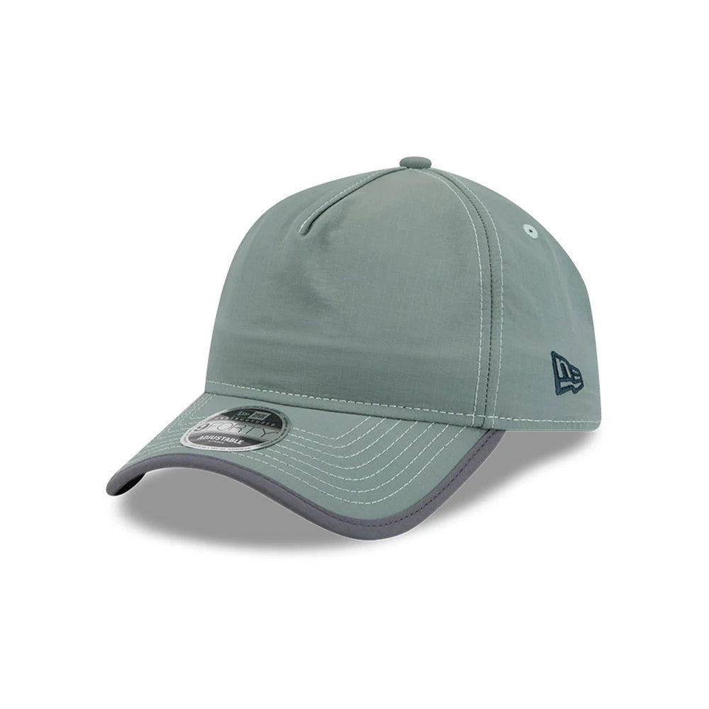New Era Elevated Basics Open Green 9FORTY A-Frame Unstructured Adjustable Cap, three-quarter view showing the dark green embroidered New Era flag logo on the left side, with white double stitching on the green visor and a 9FORTY size sticker.