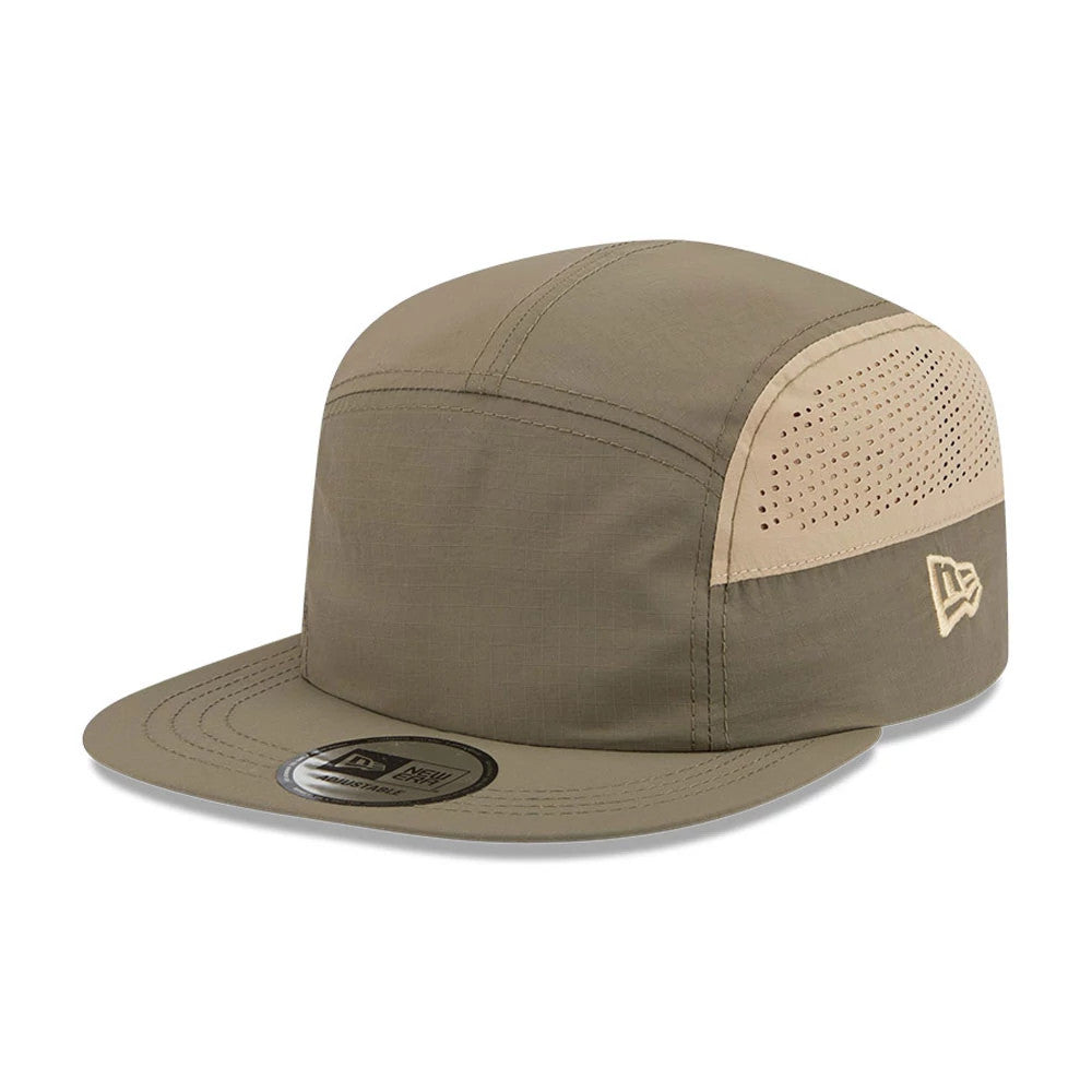 New Era Elevated Basics Open Green Camper Cap, three-quarter view showing a flat visor with a size sticker, a beige side panel with an embroidered New Era flag logo, and a structured green crown with stitching details.