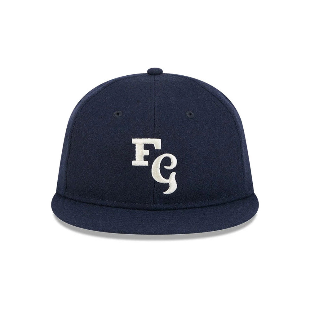 Pictured is this Fear Of God X MLB New York Yankees Retro Crown 59FIFTY Fitted cap in navy. 3
