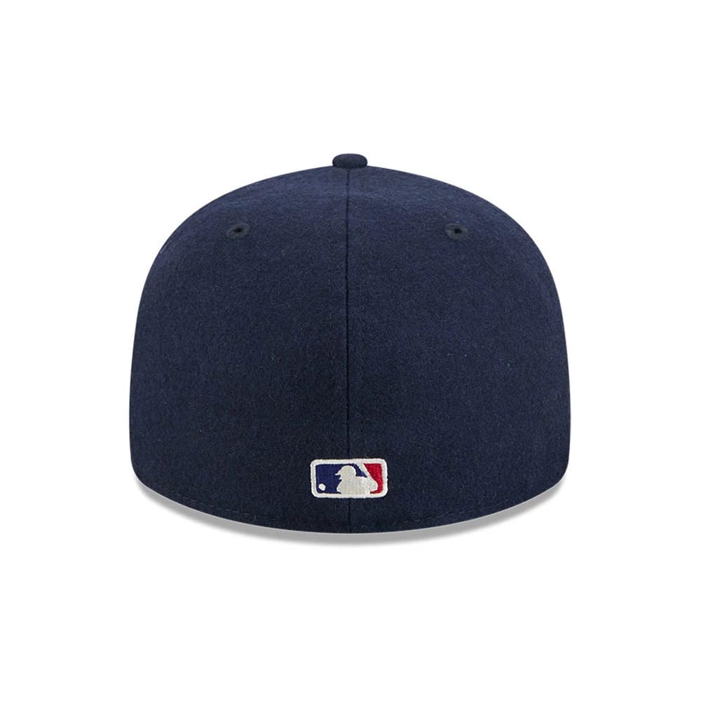 Pictured is this Fear Of God X MLB New York Yankees Retro Crown 59FIFTY Fitted cap in navy. 7