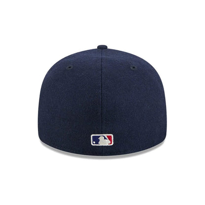 Pictured is this Fear Of God X MLB New York Yankees Retro Crown 59FIFTY Fitted cap in navy. 7