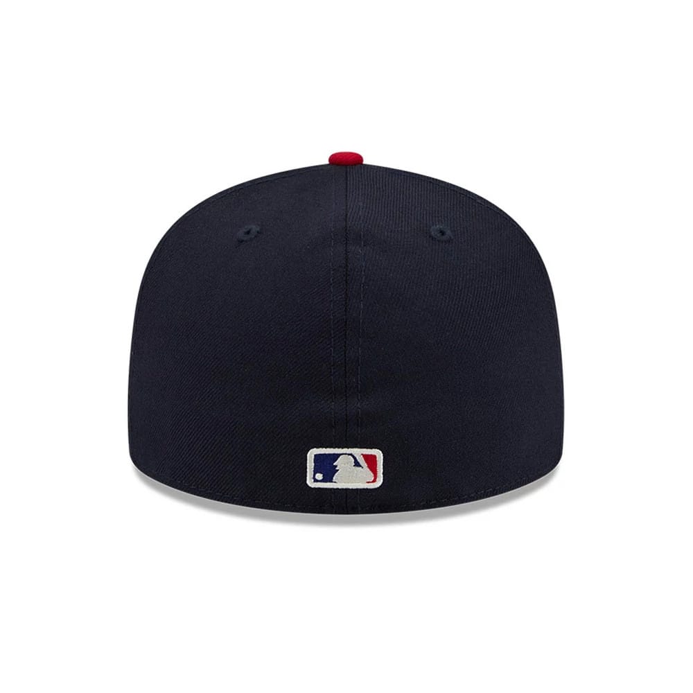 Pictured is this Fear Of God X MLB Logo 59FIFTY Fitted cap in navy & red. 7