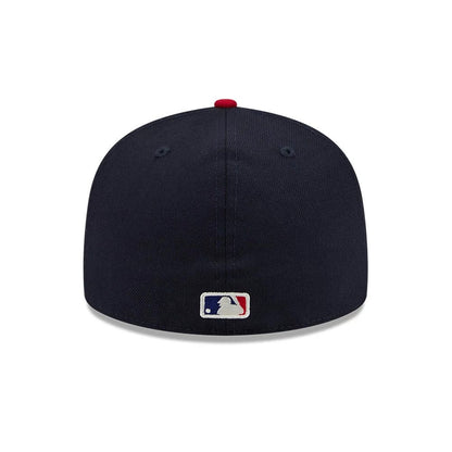 Pictured is this Fear Of God X MLB Logo 59FIFTY Fitted cap in navy & red. 7