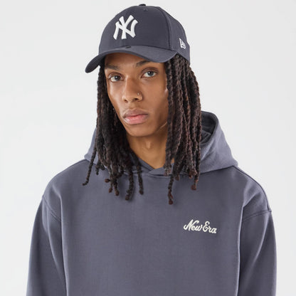 The model is wearing this New Era Open Hem Pullover Hoodie in grey. 6