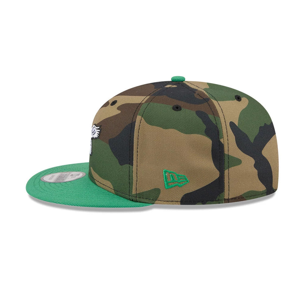 Pictured is this NFL Philadelphia Eagles 9FIFTY Snapback cap in camo & green. 6