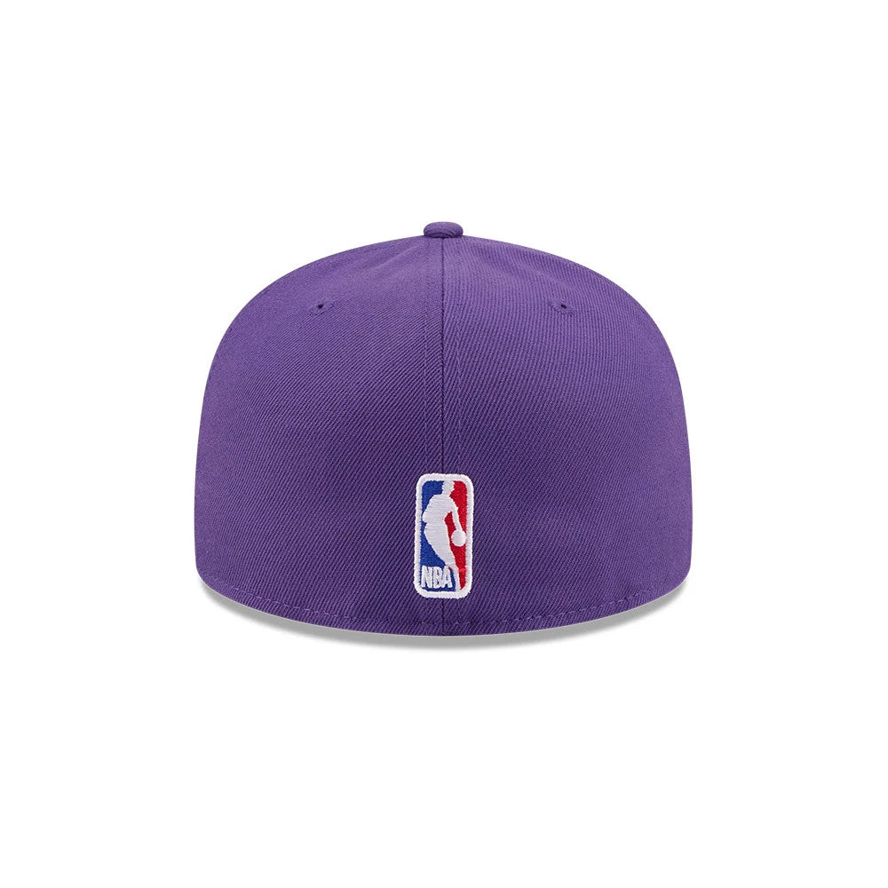 LA Lakers NBA X J-FROST Purple New Era 59FIFTY Fitted Cap, rear view showing the NBA logo embroidered at the centre of the back panels, with the structured purple crown featuring purple eyelets and a top button.