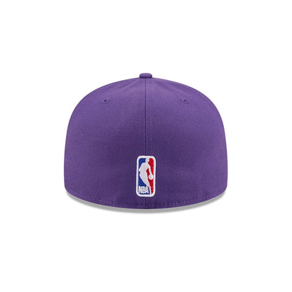 LA Lakers NBA X J-FROST Purple New Era 59FIFTY Fitted Cap, rear view showing the NBA logo embroidered at the centre of the back panels, with the structured purple crown featuring purple eyelets and a top button.
