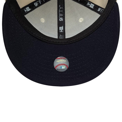 Yankees MLB Ombre Script Light Beige New Era 9FIFTY Snapback Adjustable Cap, inside view showing the grey fabric taping with 9FIFTY branding, a white sweatband, and a black undervisor featuring a baseball-themed authenticity sticker centrally placed.