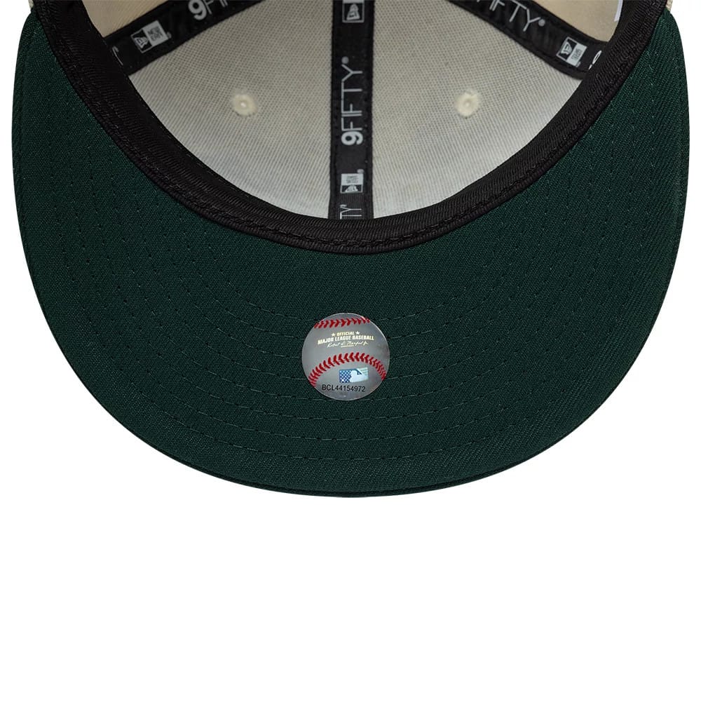 Pictured is this MLB Ombre Script Athletics 9FIFTY Snapback cap in light beige. 7