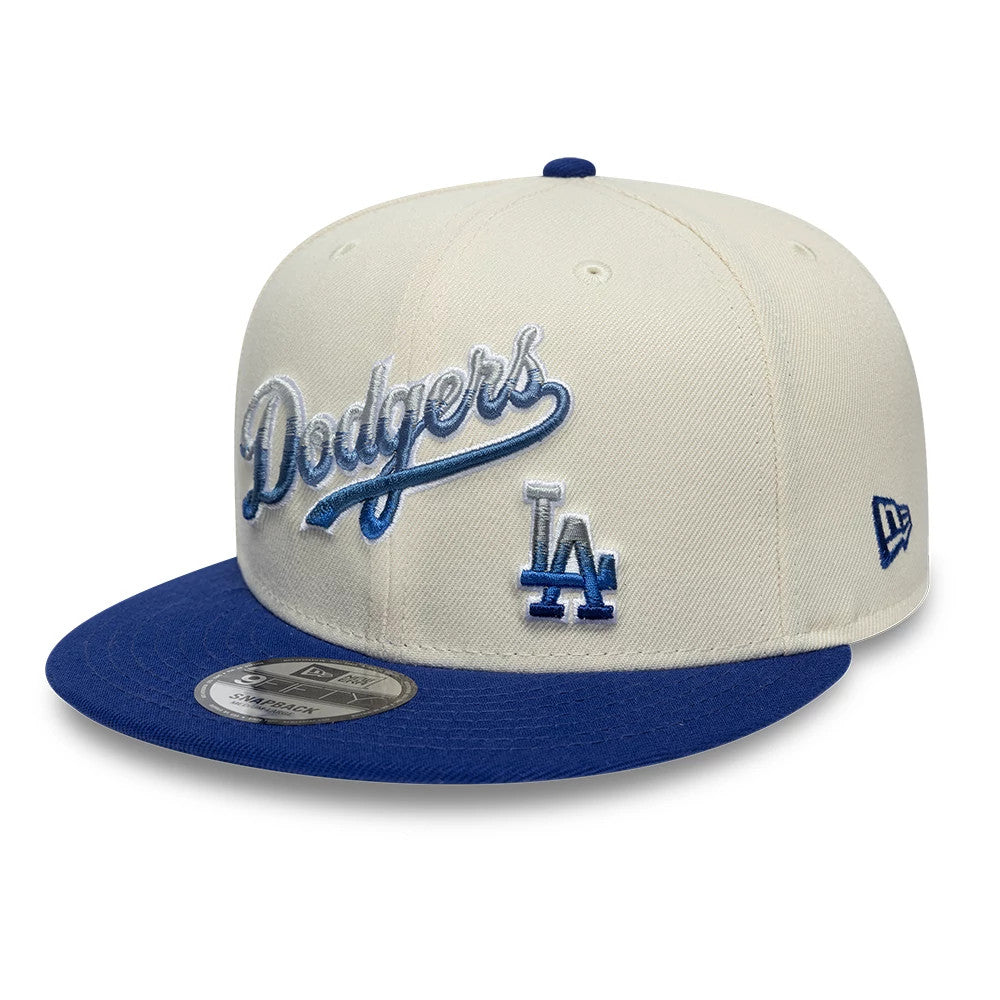 Pictured is this MLB Ombre Script Los Angeles Dodgers 9FIFTY Snapback cap in light beige & blue. 3