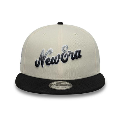 Pictured is this New Era Ombre Script 9FIFTY Snapback cap in light beige. 2