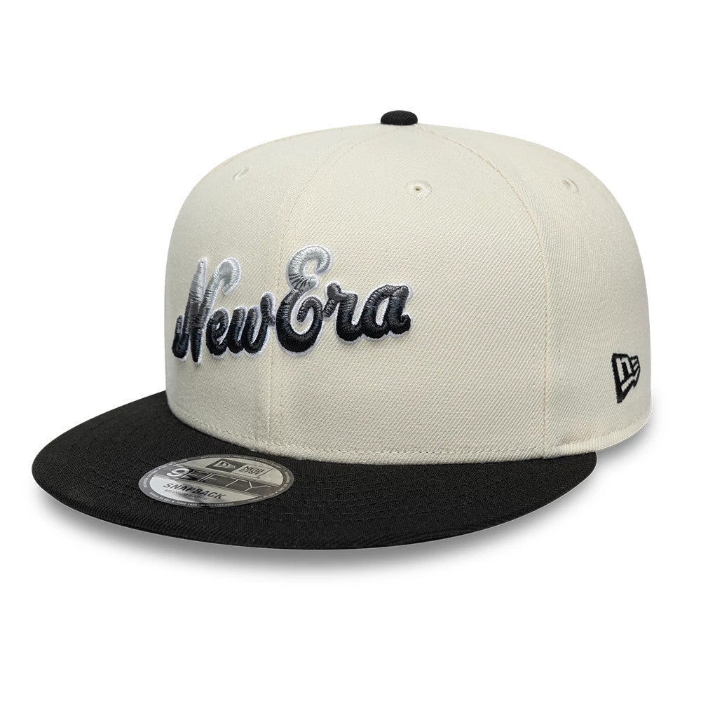 Pictured is this New Era Ombre Script 9FIFTY Snapback cap in light beige & black. 3