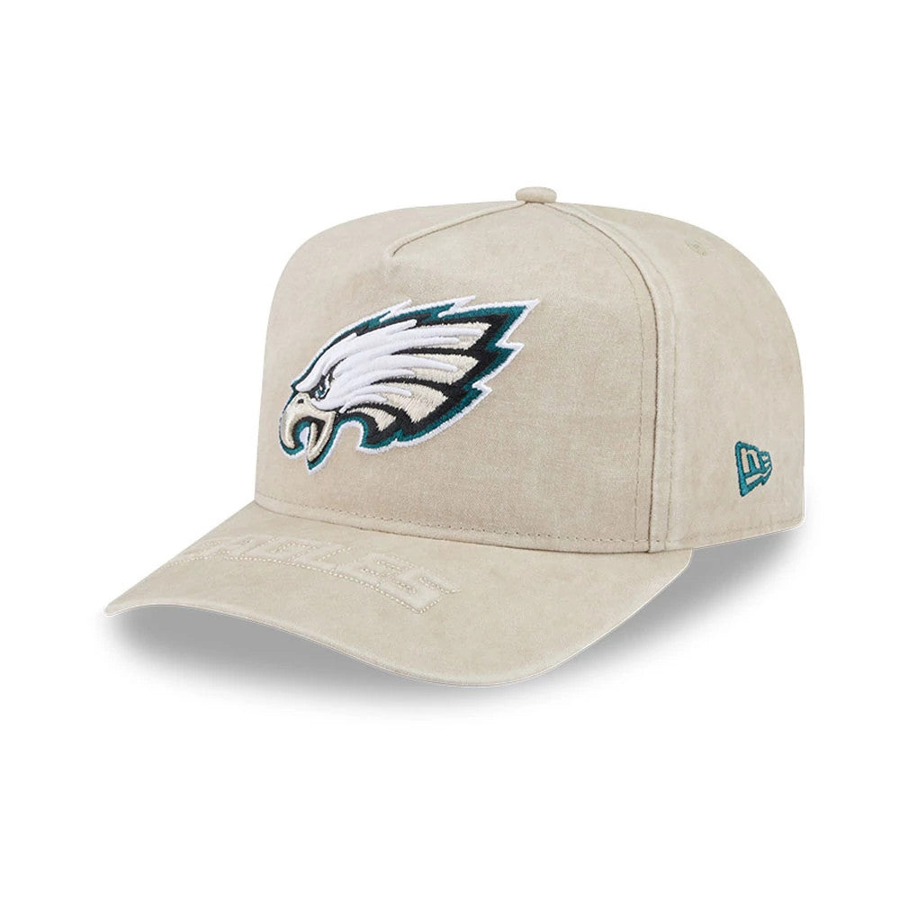 Philadelphia Eagles NFL Light Beige New Era 9FIFTY A-Frame Snapback Adjustable Cap, three-quarter view showing the raised embroidered Eagles logo on the front panel, light beige flat visor with embroidery, and teal New Era flag on the left side.