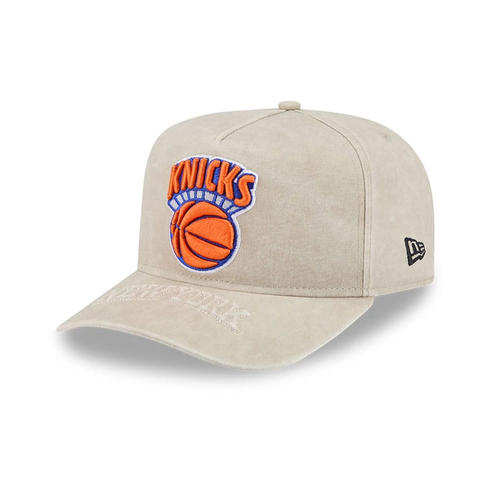 Pictured is this NBA New York Knicks 9FIFTY A-Frame Snapback cap in light beige. 1