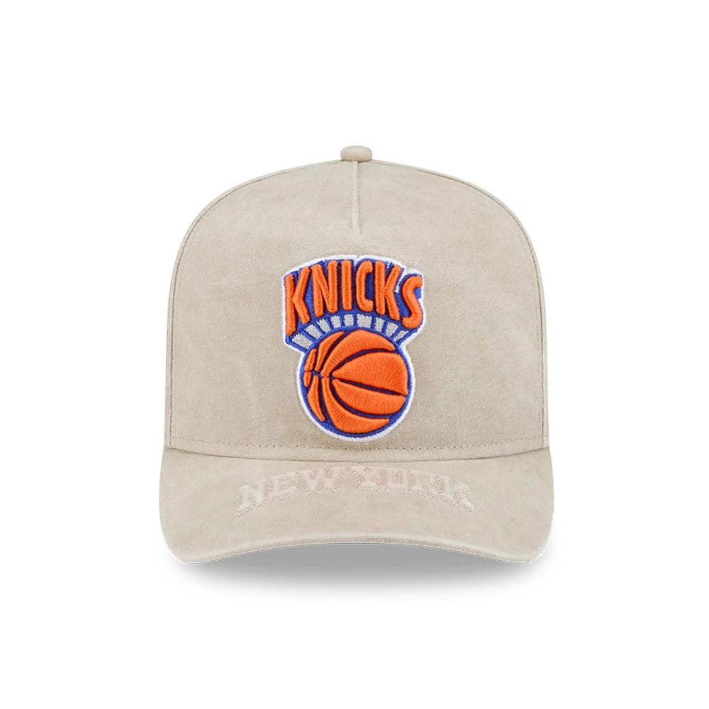 Pictured is this NBA New York Knicks 9FIFTY A-Frame Snapback cap in light beige. 3