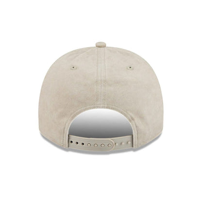 Pictured is this NBA New York Knicks 9FIFTY A-Frame Snapback cap in light beige. 6