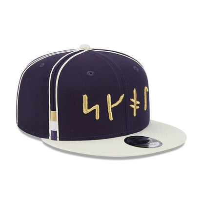 Pictured is this NFL Rivalry 2026 Minnesota Vikings 9FIFTY Snapback cap in dark purple. 2