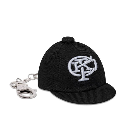 The model is wearing this Gettomasa X New Era Key Chain in black. 4