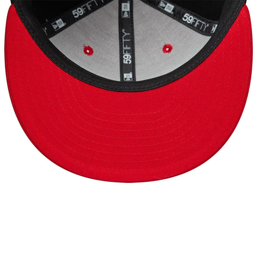 Chicago Bulls NBA Hardwood Classic Players Red New Era 59FIFTY Fitted Cap, inside view showing the black 59FIFTY taping against a grey interior, red eyelets, and a red undervisor contrasted by a black sweatband.