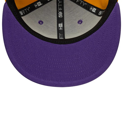 LA Lakers NBA Hardwood Classic Players Purple New Era 59FIFTY Fitted Cap, inside view showing the black taping with New Era branding, purple eyelets, an orange sweatband, and a vivid purple undervisor complementing the structured design.