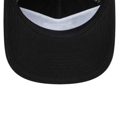 Toronto Raptors NBA Hardwood Classic Black New Era 19TWENTY Adjustable Cap, inside view showing the white sweatband contrasting with the black undervisor and black interior, highlighting the clean stitching under a curved visor.