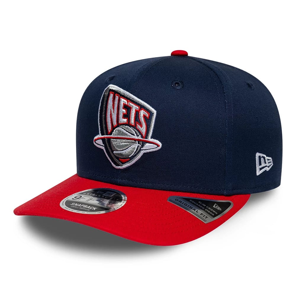 Pictured is this NBA Hardwood Classic New Jersey Nets 9FIFTY Snapback cap in dark blue. 1