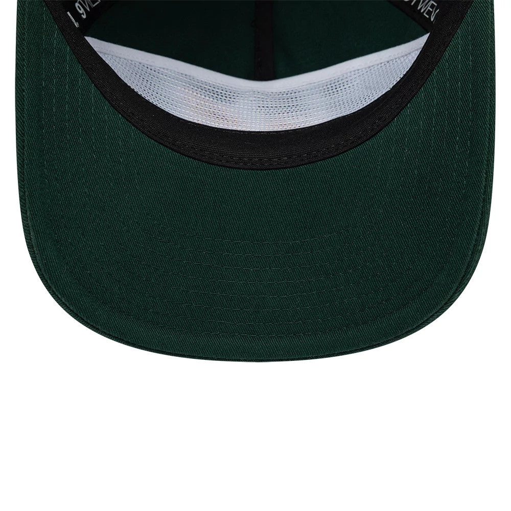 Supersonics NBA Hardwood Classic Dark Green New Era 19TWENTY Adjustable Cap, inside view showing the white mesh sweatband lining, black internal tape with New Era branding, and dark green undervisor extending from the structured crown.