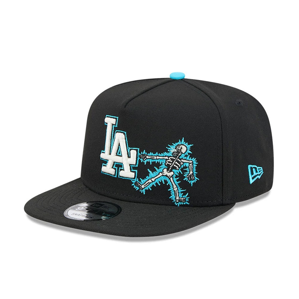 LA Dodgers MLB Electrocute Black New Era 9FIFTY A-Frame Snapback Adjustable Cap, front view showing the white and teal embroidered LA logo with an electrified skeleton graphic on the black crown, flat black visor, and a 9FIFTY size sticker.