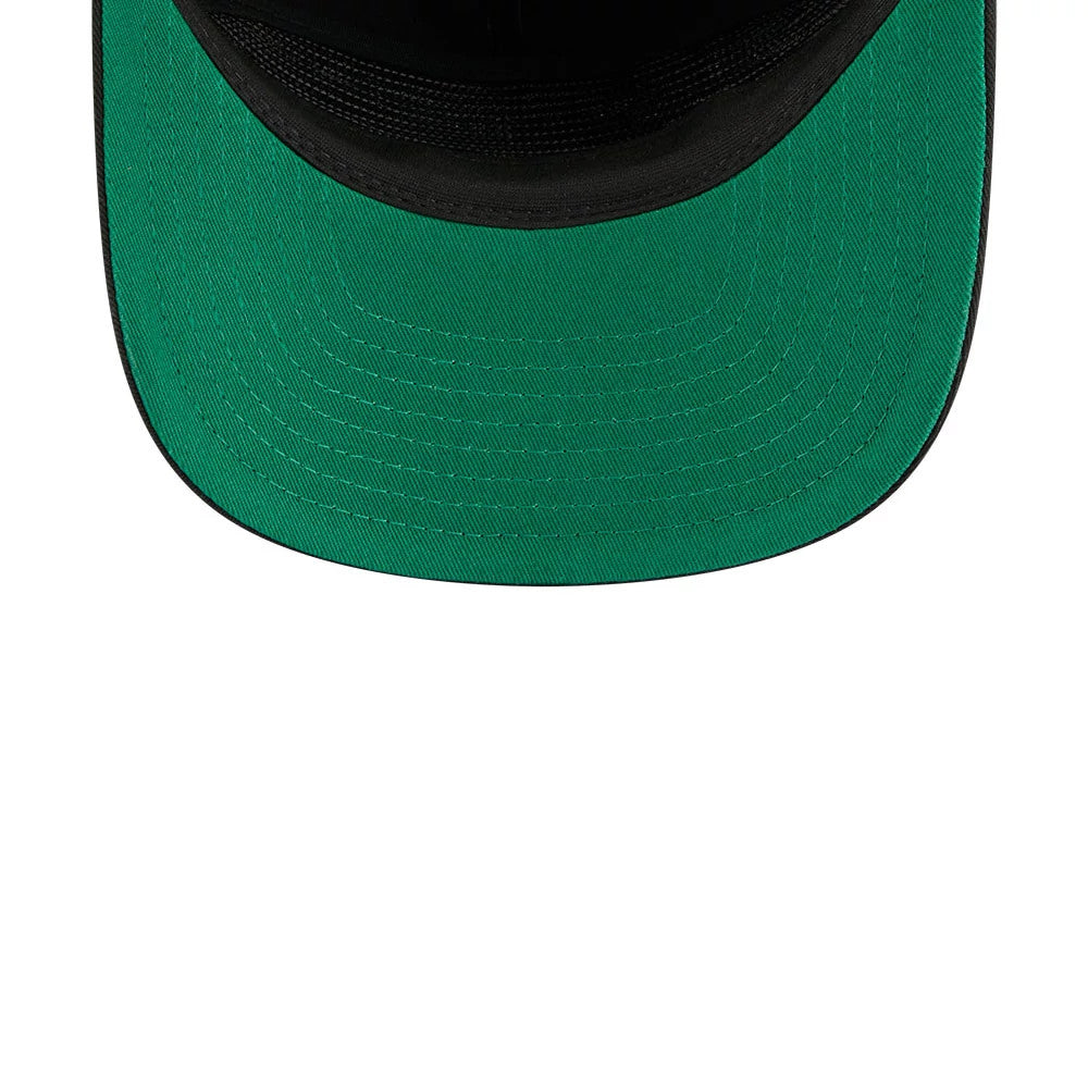 Friday The 13th They Were Warned Black New Era 19TWENTY Adjustable Cap, inside view showing the green undervisor contrasted with the black sweatband and interior taping, offering a detailed look at the craftsmanship of the cap's construction.