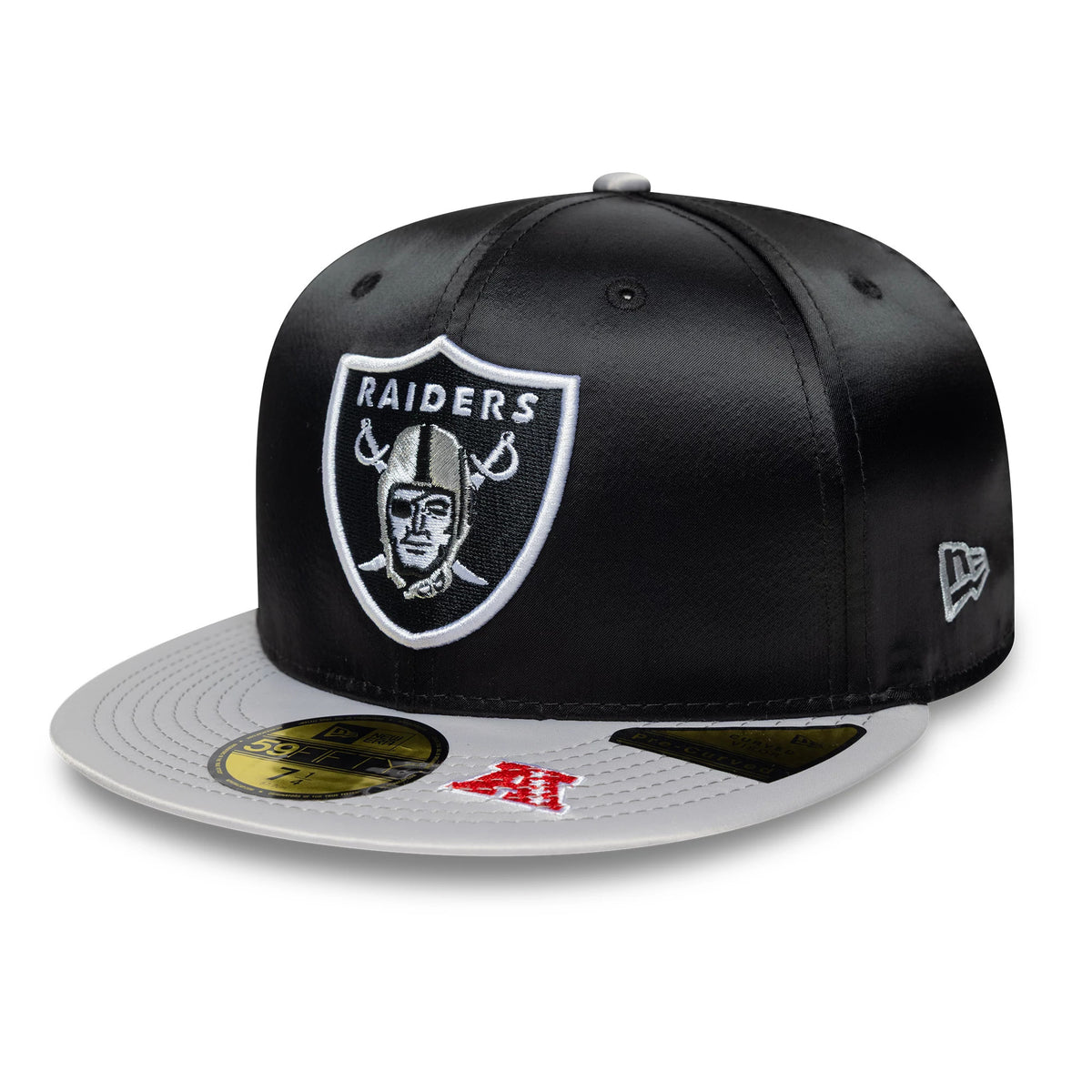 LA Raiders NFL Satin Black & Grey New Era 59FIFTY Fitted Cap, three-quarter view showing the raised embroidered Raiders logo on the front panel, contrasting grey flat visor with a gold 59FIFTY size sticker.