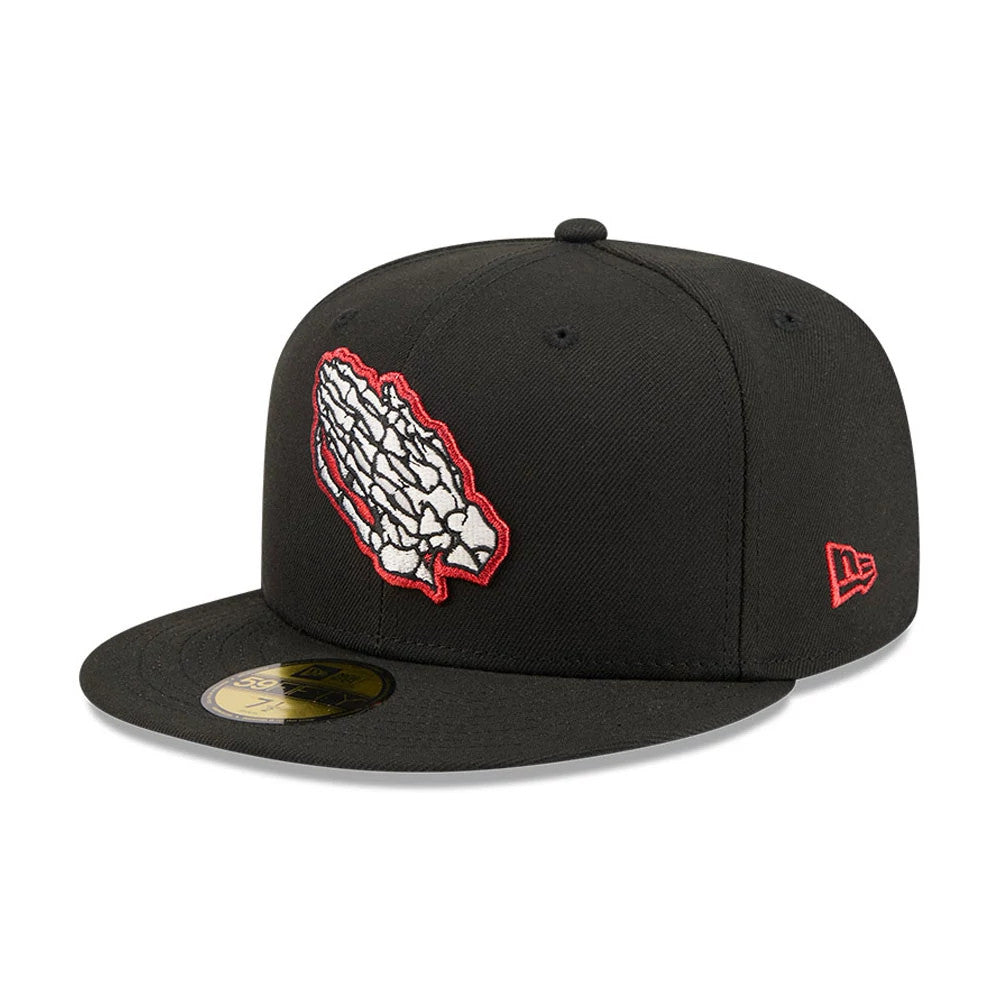 New Era Praying Skeleton Black 59FIFTY Fitted Cap, three-quarter view showing a raised embroidered white skeleton graphic with a red outline on the front panels, a black visor with a gold 59FIFTY size sticker.