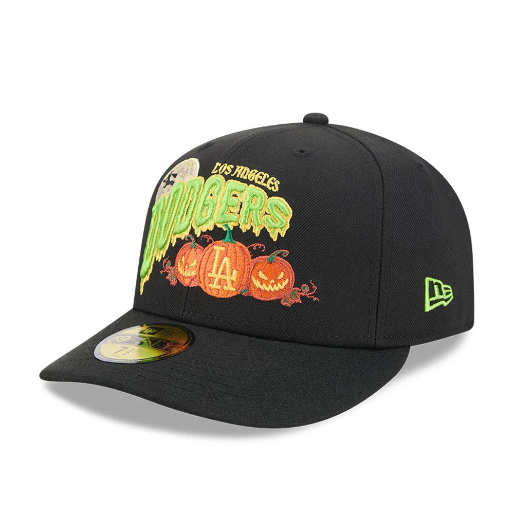LA Dodgers MLB Pumpkin Patch Black New Era 59FIFTY Fitted Cap, front view showing the green Dodgers logo with a spooky dripping effect, orange pumpkin graphics with an LA embroidery, and a gold 59FIFTY size sticker on the flat black visor.
