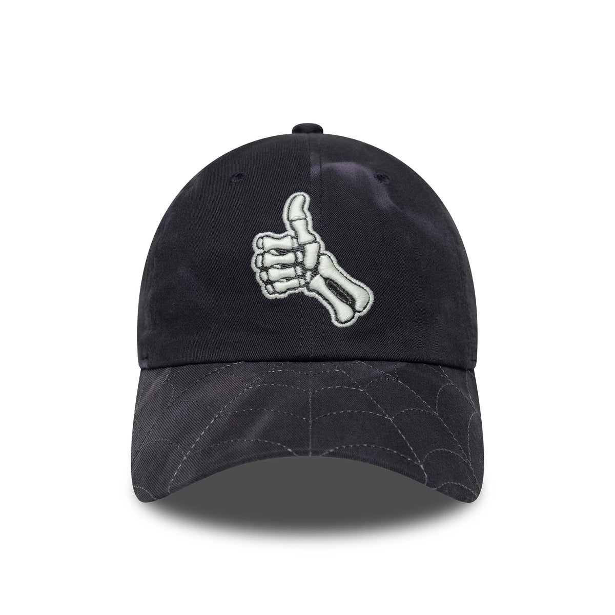 New Era Thumbs Up Skeleton Black Casual Classic Adjustable Cap, front view showing a white embroidered skeleton hand giving a thumbs up on the black front panel, with a patterned curved visor.