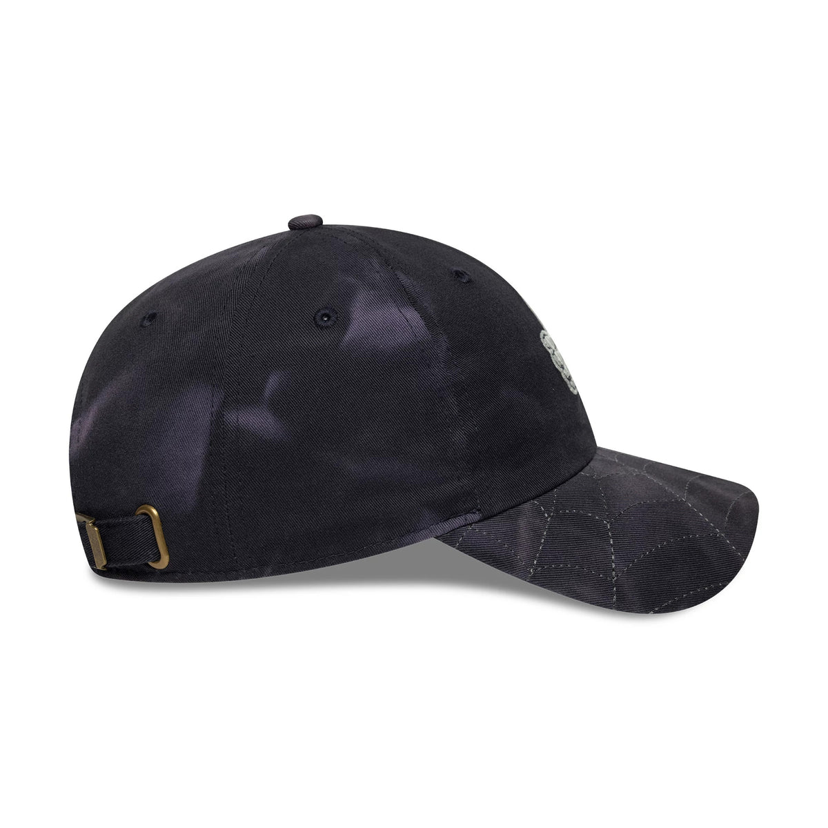 New Era Thumbs Up Skeleton Black Casual Classic Adjustable Cap, side view showing the skeleton graphic detail on the front panel, a black curved visor with white stitching, and an adjustable strap with a brass buckle at the back.