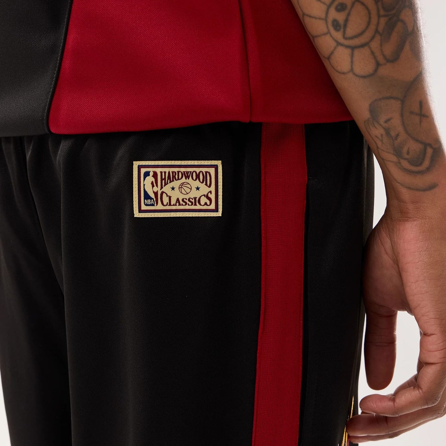 The model is wearing this NBA Hardwood Classic Straight Miami Heat Straight Leg Joggers in black. 7