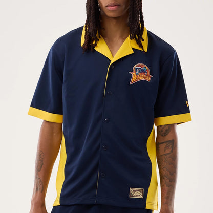 The model is wearing this NBA Hardwood Classic Revere Golden State Warriors Short Sleeve Shirt in dark blue. 5