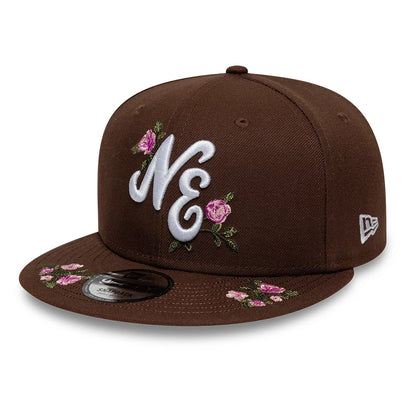 Pictured is this New Era Floral 9FIFTY Snapback cap in dark brown. 1