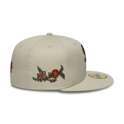 Chicago White Sox MLB Floral Light Beige New Era 59FIFTY Fitted Cap, side view showing embroidered red and orange floral graphics along the side of the structured beige crown, with the flat visor and gold 59FIFTY size sticker on top.