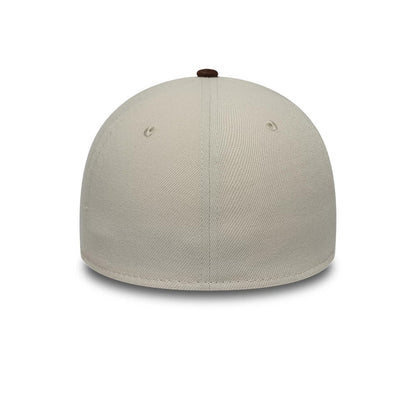 New Era Suede Visor Light Beige 39THIRTY Stretch Fit Cap, rear view showing the seamless light beige back panels with two eyelets and a contrasting dark brown top button, highlighting the stretch fit design without back logos.