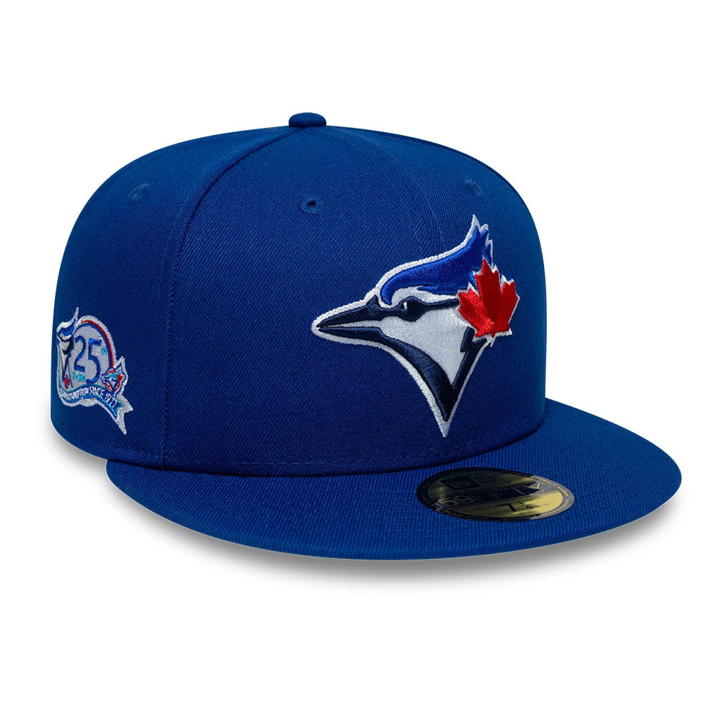 Pictured is this MLB Cooperstown Toronto Blue Jays 59FIFTY Fitted cap in blue. 1